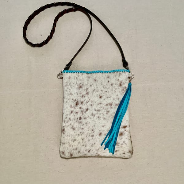 Handcrafted western leather crossbody purse with fringe